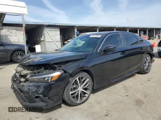 2022 Honda Civic Touring z VIN 2HGFE1F90NH304103, wystawiony jako Copart lot #54510935 z przebiegiem 21 650 mil mil oraz Szkoda całkowita • Salvage title. Historia ofert i sprzedaży dostępna na DreamBid. Obrazek 1.
