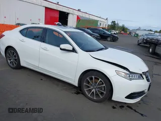 2015 Acura TLX V6 z VIN 19UUB2F30FA012923, wystawiony jako IAAI lot #42000107 z przebiegiem 101 133 mil mil oraz . Historia ofert i sprzedaży dostępna na DreamBid. Obrazek 1.