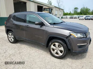 2018 Jeep Compass Altitude with VIN 3C4NJDBB9JT457242, listed as a Copart auction lot 60886385 with 143,467 mi miles and Salvage title. Bid and sale history available at DreamBid. Image 4.