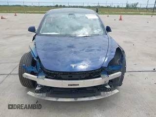 2022 Tesla Model 3 Long Range z VIN 5YJ3E1EB2NF246443, wystawiony jako IAAI lot #42179219 z przebiegiem Nie podano mil oraz . Historia ofert i sprzedaży dostępna na DreamBid. Obrazek 10.