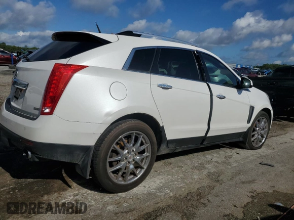 2014 Cadillac SRX Premium Collection z VIN 3GYFNGE31ES615593, wystawiony jako Copart lot #56785775 z przebiegiem 247 230 mil mil oraz Tytuł czysty. Historia ofert i sprzedaży dostępna na DreamBid. Obrazek 3.