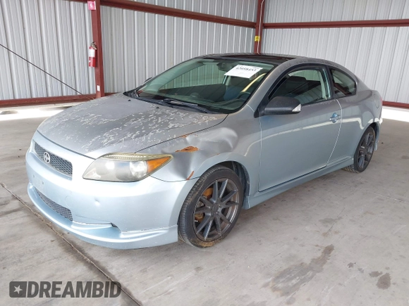 2007 Scion tC Spec with VIN JTKDE177270163067, listed as a IAAI auction lot 42058453 with 265,531 mi miles. Bid and sale history available at carsss.com. Image 2.