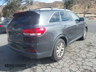 2017 Kia Sorento LX V6 with VIN 5XYPG4A52HG228342, listed as a IAAI auction lot 41430702 with 135,131 mi miles. Bid and sale history available at carsss.com. Image 4.