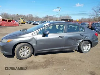 2012 Honda Civic LX z VIN 19XFB2F52CE329264, wystawiony jako IAAI lot #41654894 z przebiegiem 110 836 mil mil oraz . Historia ofert i sprzedaży dostępna na DreamBid. Obrazek 18.