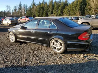 2005 Mercedes-Benz E-Class 5.5L AMG with VIN WDBUF76J25A746426, listed as a Copart auction lot 85879584 with 134,055 mi miles and Salvage Title. Bid and sale history available at carsss.com. Image 2.