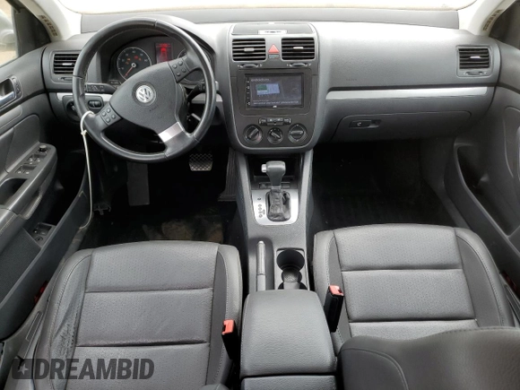 2008 Volkswagen Jetta SE z VIN 3VWRM71K08M099347, wystawiony jako Copart lot #57061795 z przebiegiem 129 225 mil mil oraz Szkoda całkowita • Salvage title. Historia ofert i sprzedaży dostępna na DreamBid. Obrazek 8.