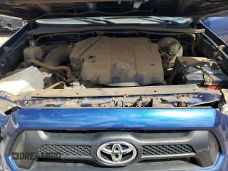 2015 Toyota Tacoma z VIN 3TMLU4EN4FM166332, wystawiony jako Copart lot #58080185 z przebiegiem 94 135 mil mil oraz Czysty tytuł • Clean title. Historia ofert i sprzedaży dostępna na DreamBid. Obrazek 11.