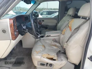 2001 GMC Yukon SLT z VIN 1GKEC13T51J117159, wystawiony jako Copart lot #55241255 z przebiegiem 209 440 mil mil oraz Szkoda całkowita • Salvage title. Historia ofert i sprzedaży dostępna na DreamBid. Obrazek 7.