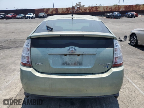 2008 Toyota Prius with VIN JTDKB20U483405080, listed as a Copart auction lot 64610995 with 127,437 mi miles and Salvage title. Bid and sale history available at DreamBid. Image 6.