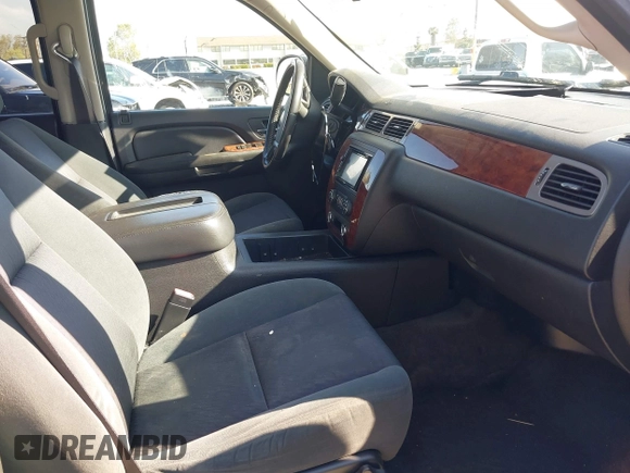 2009 Chevrolet Tahoe 2LT z VIN 1GNFC23059R186790, wystawiony jako IAAI lot #41929109 z przebiegiem 263 596 mil mil oraz . Historia ofert i sprzedaży dostępna na DreamBid. Obrazek 5.