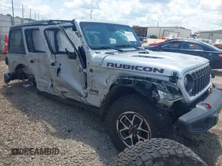 2024 Jeep Wrangler Rubicon with VIN 1C4PJXFG6RW253116, listed as a IAAI auction lot 42641276 with 30,359 mi miles and . Bid and sale history available at DreamBid. Image 1.