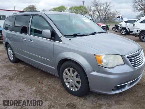 2014 Chrysler Town & Country Touring with VIN 2C4RC1BG7ER208324, listed as a IAAI auction lot 42102263 with 223,953 mi miles. Bid and sale history available at carsss.com. Image 1.