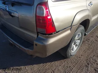 2006 Toyota 4Runner SR5 with VIN JTEBU14R568055724, listed as a IAAI auction lot 41450451 with 230,598 mi miles. Bid and sale history available at carsss.com. Image 6.