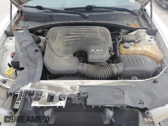 2014 Dodge Charger SE with VIN 2C3CDXBG9EH129799, listed as a Copart auction lot 50556275 with 167,061 mi miles and Salvage Title. Bid and sale history available at DreamBid. Image 11.