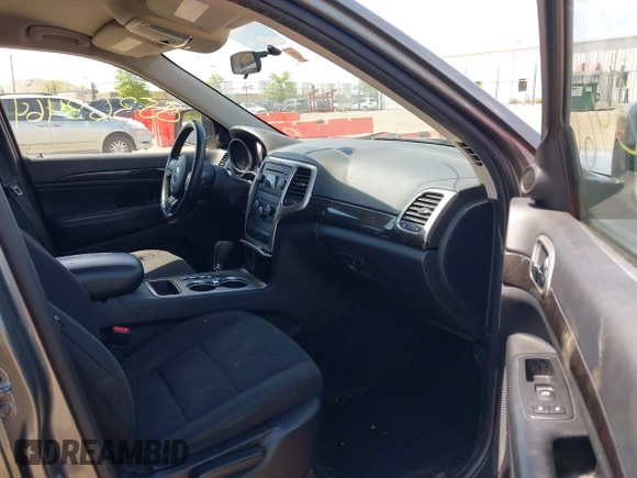 2011 Jeep Grand Cherokee Laredo with VIN 1J4RR4GGXBC587911, listed as a IAAI auction lot 42156885 with 178,999 mi miles and . Bid and sale history available at DreamBid. Image 5.