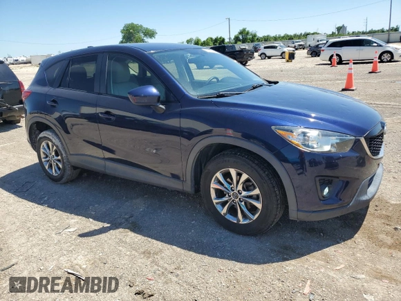 2014 Mazda CX-5 Touring with VIN JM3KE2CY7E0362879, listed as a Copart auction lot 53079545 with 70,863 mi miles and Salvage Title. Bid and sale history available at carsss.com. Image 4.
