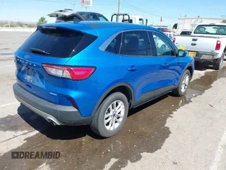 2021 Ford Escape SE with VIN 1FMCU9G6XMUA81082, listed as a IAAI auction lot 42056323 with 83,904 mi miles. Bid and sale history available at carsss.com. Image 4.