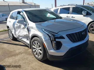 2020 Cadillac XT4 FWD Luxury with VIN 1GYAZAR45LF039362, listed as a IAAI auction lot 41445409 with 76,869 mi miles. Bid and sale history available at carsss.com. Image 1.
