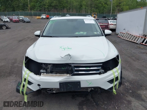 2018 Volkswagen Tiguan SEL with VIN 3VV2B7AX7JM099570, listed as a IAAI auction lot 42374274 with 87,838 mi miles and . Bid and sale history available at DreamBid. Image 12.