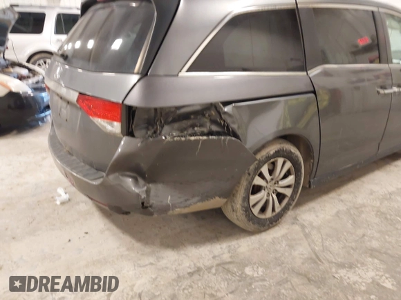 2014 Honda Odyssey EX-L with VIN 5FNRL5H67EB056983, listed as a IAAI auction lot 42318699 with 256,267 mi miles and . Bid and sale history available at DreamBid. Image 6.