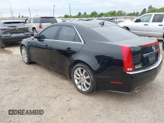 2009 Cadillac CTS RWD w/1SB with VIN 1G6DV57V390109182, listed as a IAAI auction lot 42177968 with Not Provided miles. Bid and sale history available at carsss.com. Image 3.