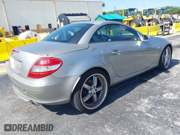 2005 Mercedes-Benz SLK 230/320 with VIN WDBWK56F85F032243, listed as a IAAI auction lot 42267834 with 128,289 mi miles and . Bid and sale history available at DreamBid. Image 4.