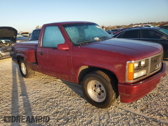 1989 GMC Sierra 1500 with VIN 1GTDC14HXKZ548889, listed as a Copart auction lot 74876684 with 205,365 mi miles and Salvage Title. Bid and sale history available at DreamBid. Image 4.