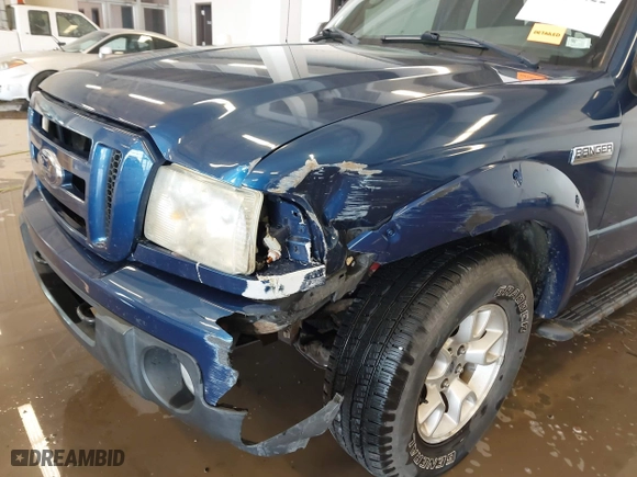 2011 Ford Ranger XLT with VIN 1FTLR4FE3BPA52049, listed as a IAAI auction lot 41394422 with 112,080 mi miles. Bid and sale history available at carsss.com. Image 18.