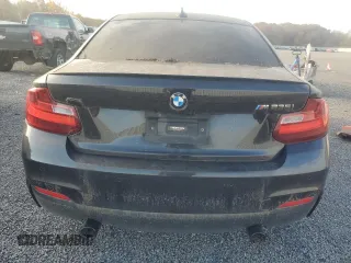 2016 BMW 2 Series M235i xDrive with VIN WBA1J9C57GV371986, listed as a Copart auction lot 77871604 with 0 mi miles and Salvage Title. Bid and sale history available at carsss.com. Image 6.