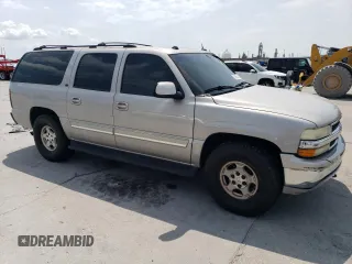 2005 Chevrolet Suburban LT with VIN 1GNFK16Z05J174384, listed as a Copart auction lot 82941113 with 0 mi miles and Salvage Title. Bid and sale history available at carsss.com. Image 4.