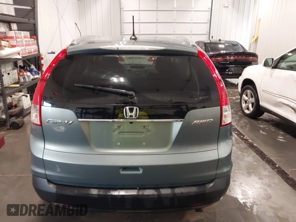 2012 Honda CR-V EX-L z VIN JHLRM4H75CC014793, wystawiony jako IAAI lot #42575591 z przebiegiem 91 002 mil mil oraz . Historia ofert i sprzedaży dostępna na DreamBid. Obrazek 16.