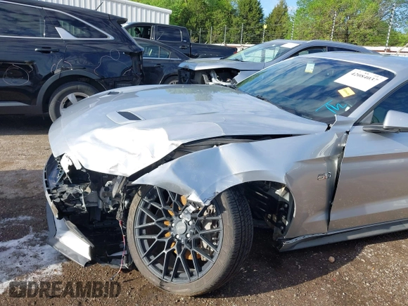 2018 Ford Mustang GT z VIN 1FA6P8CF4J5182655, wystawiony jako IAAI lot #42084037 z przebiegiem 57 987 mil mil oraz . Historia ofert i sprzedaży dostępna na DreamBid. Obrazek 6.