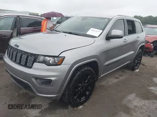 2018 Jeep Grand Cherokee Laredo E with VIN 1C4RJFAG6JC452859, listed as a IAAI auction lot 42647127 with 107,869 mi miles and . Bid and sale history available at DreamBid. Image 16.