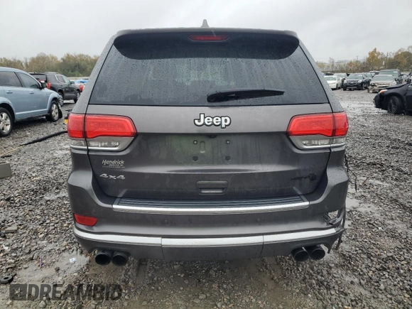 2017 Jeep Grand Cherokee Summit with VIN 1C4RJFJT1HC818136, listed as a Copart auction lot 81057084 with 135,843 mi miles and Salvage title. Bid and sale history available at DreamBid. Image 6.