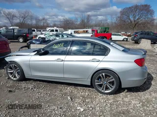 2015 BMW 3 Series 328i with VIN WBA3A5C55FF609490, listed as a IAAI auction lot 42006008 with 110,239 mi miles. Bid and sale history available at carsss.com. Image 14.
