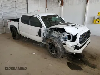 2018 Toyota Tacoma SR z VIN 3TMCZ5AN7JM178223, wystawiony jako Copart lot #49588605 z przebiegiem 179 064 mil mil oraz Szkoda całkowita • Salvage title. Historia ofert i sprzedaży dostępna na DreamBid. Obrazek 4.