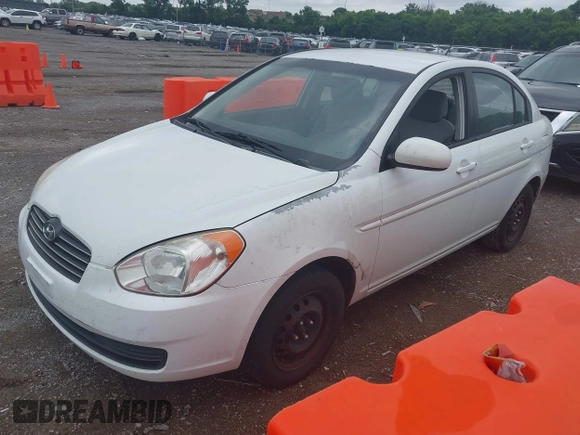 2011 Hyundai Accent GLS z VIN KMHCN4AC7BU609303, wystawiony jako IAAI lot #42523271 z przebiegiem 157 830 mil mil oraz . Historia ofert i sprzedaży dostępna na DreamBid. Obrazek 2.