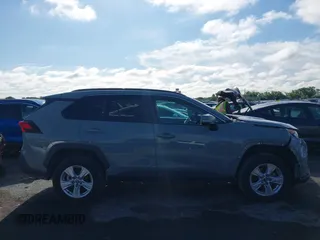 2021 Toyota RAV4 XLE with VIN 2T3W1RFV6MW163395, listed as a IAAI auction lot 42455461 with 65,840 mi miles and . Bid and sale history available at DreamBid. Image 13.
