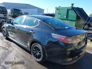 2015 Kia Optima Hybrid with VIN KNAGM4AD3F5088949, listed as a IAAI auction lot 41008816 with 138,921 mi miles. Bid and sale history available at carsss.com. Image 3.