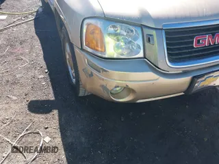 2004 GMC Envoy SLE z VIN 1GKDS13S442179334, wystawiony jako IAAI lot #41693042 z przebiegiem 224 868 mil mil oraz . Historia ofert i sprzedaży dostępna na DreamBid. Obrazek 6.