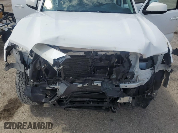 2018 Toyota Tacoma SR5 z VIN 3TMAZ5CN0JM056596, wystawiony jako Copart lot #58373385 z przebiegiem 60 798 mil mil oraz Szkoda całkowita • Salvage title. Historia ofert i sprzedaży dostępna na DreamBid. Obrazek 11.