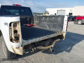 2013 GMC Sierra 1500 SLE with VIN 1GTR2VE71DZ114241, listed as a IAAI auction lot 41719789 with 199,868 mi miles. Bid and sale history available at carsss.com. Image 6.