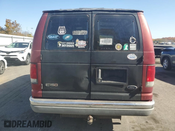 1999 Ford Econoline Cargo with VIN 1FDRE14W1XHB36383, listed as a Copart auction lot 77230084 with 222,420 mi miles and Salvage Title. Bid and sale history available at carsss.com. Image 6.