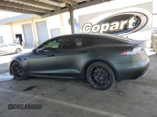 2018 Tesla Model S 75D with VIN 5YJSA1E21JF282786, listed as a Copart auction lot 58058595 with 65,982 mi miles and Salvage title. Bid and sale history available at DreamBid. Image 2.