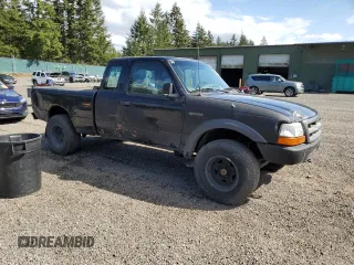 1999 Ford Ranger XL with VIN 1FTZR15V7XTA62124, listed as a Copart auction lot 55239095 with 284,087 mi miles and Clean title. Bid and sale history available at DreamBid. Image 4.