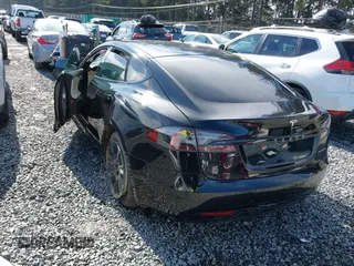 2021 Tesla Model S Long Range Plus z VIN 5YJSA1E24MF426299, wystawiony jako IAAI lot #41673498 z przebiegiem 102 035 mil mil oraz . Historia ofert i sprzedaży dostępna na DreamBid. Obrazek 3.