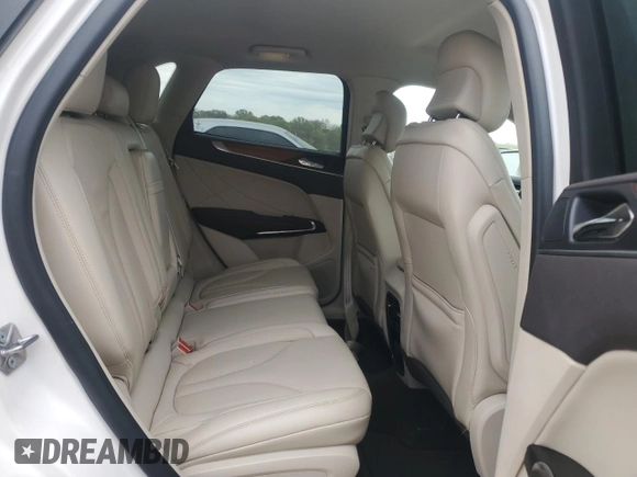 2019 Lincoln MKC Select z VIN 5LMCJ2D99KUL39648, wystawiony jako Copart lot #53755895 z przebiegiem 57 623 mil mil oraz Szkoda całkowita • Salvage title. Historia ofert i sprzedaży dostępna na DreamBid. Obrazek 11.