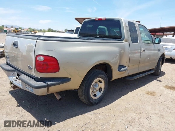 2000 Ford F-150 XL with VIN 1FTRX07W6YKB19703, listed as a IAAI auction lot 42375355 with Not provided miles and . Bid and sale history available at DreamBid. Image 4.
