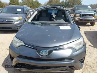 2016 Toyota RAV4 Hybrid Limited with VIN JTMDJREV7GD047729, listed as a IAAI auction lot 41833765 with 114,830 mi miles. Bid and sale history available at carsss.com. Image 6.