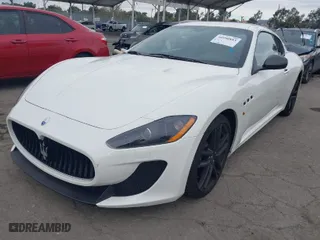 2012 Maserati GranTurismo MC Stradale with VIN ZAM45MLA9C0065671, listed as a IAAI auction lot 40990883 with 27,041 mi miles. Bid and sale history available at carsss.com. Image 2.